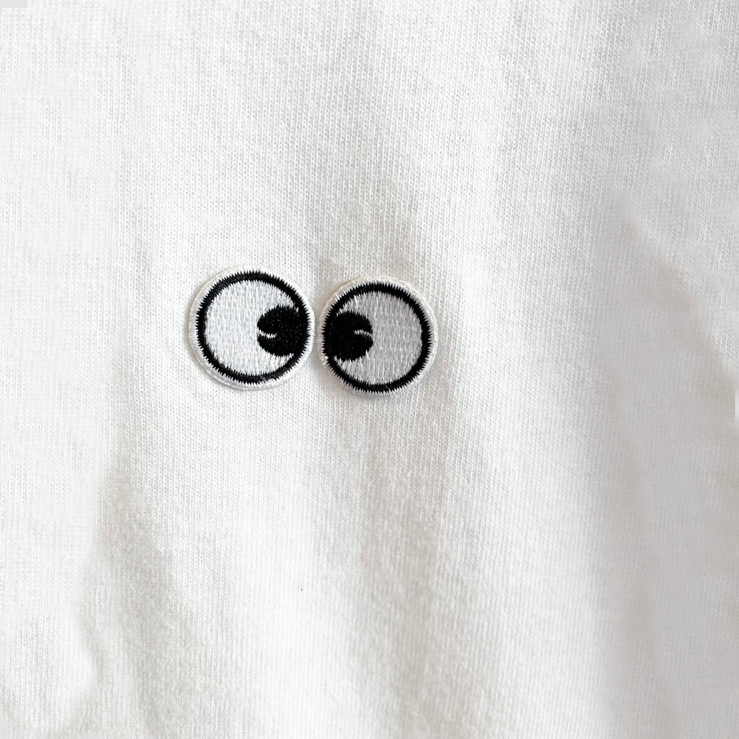 TEE: Cross Eyed Short Sleeve Cru Neck Tee
