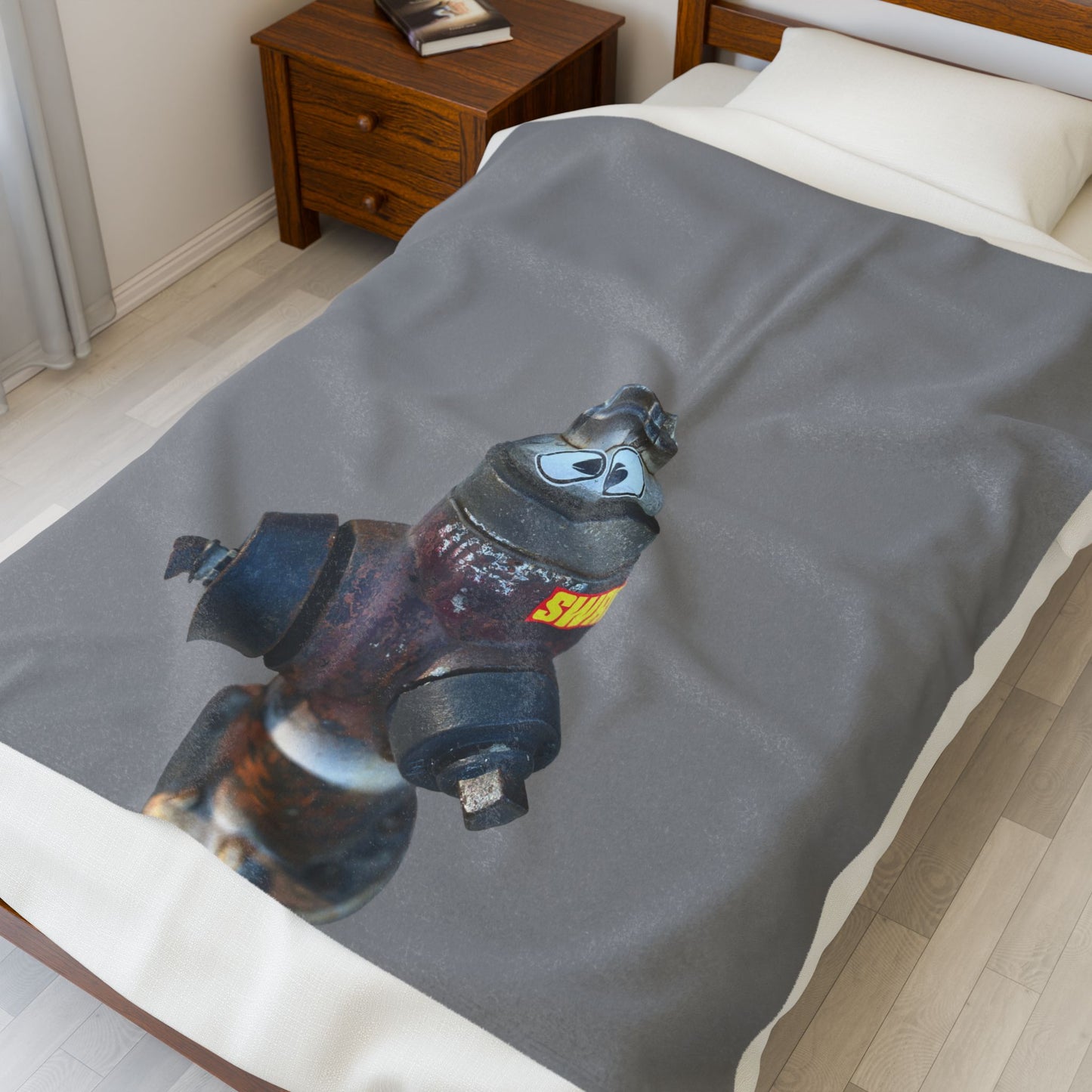 Plush Blanket with Googly Eye Cru fire hydrant character. Silly and cozy