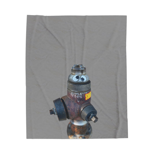 Plush Blanket with Googly Eye Cru fire hydrant character. Silly and cozy
