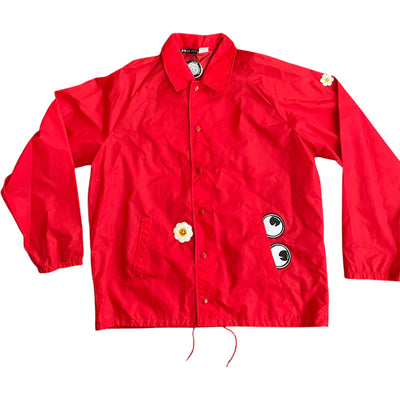 Upcycled Coaches jacket with flower and eye patches